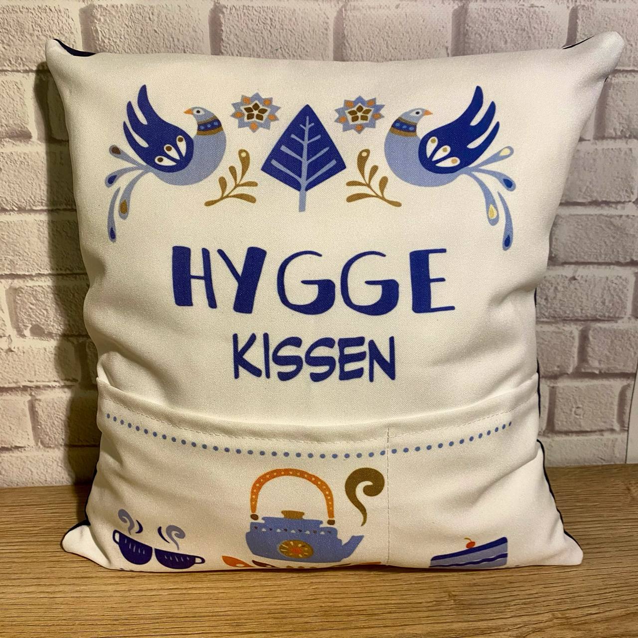 Hygge-Kissen mit einer Tasche